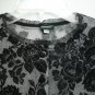 Evolution not Revolution Black Floral Pattern Scalloped Edges Lace Trim Neckline