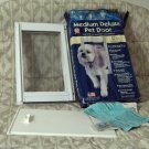 IDEAL PET PRODUCTS Deluxe Medium Dog Doggie Door Unused