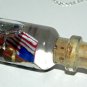 The Road to Power, Bottle Necklace
