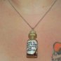 The Road to Power, Bottle Necklace