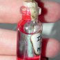The Dark Passenger, Bottle Necklace