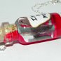 The Dark Passenger, Bottle Necklace