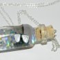 I Wear My Sunglases at Night, Bottle Necklace