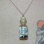I Wear My Sunglases at Night, Bottle Necklace