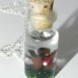 Voodoo, Voodoo! Mini Voodoo Doll Bottle Necklace
