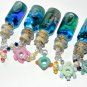 Baby Seahorse with Floating Toy, Bottle Necklace