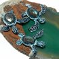 Take Courage! Labradorite Baby Sea Turtles on Agate Pendant
