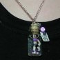 I just want is a hula hoop! Tiny Hula Hoop Dancer Bottle Necklace