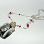 The De-Vil wears furs! Handmade, Hand Sculpted, Bottle Necklace