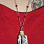 The De-Vil wears furs! Handmade, Hand Sculpted, Bottle Necklace