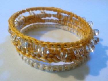 Stack of 4 Yellow and Ivory Crochet Bangle Bracelets with Glass Beads