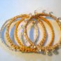 Stack of 4 Yellow and Ivory Crochet Bangle Bracelets with Glass Beads