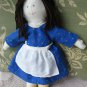 Brown-Haired Doll with Blue Dress and Apron