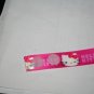 Peace sign choker on Hello Kitty ribbon