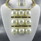 GOLD PLATED METAL MULTI CREAM PEARL DANGLING FUNKY CHOKER SET