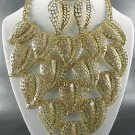 GOLD PLATED METAL LEAF DANGLING NECKLACE SET. 18"L - 3"EXTENDER EARRINGS