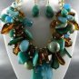 GOLD PLATED METAL BLUES TONE BEADS CHUNKY NECKLACE SET. 18"L - 4"EXTEN EARRINGS