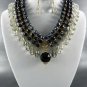 PLATED METAL AB TEAR DROP STONE DANGLING NECKLACE SET. 17"L - 3"EXTEND EARRINGS