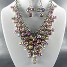 # 7 DANGLING YOUR CHOICE OF COLOR STONE NECKLACE SET. 1Earrings