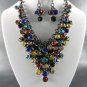 # 9 DANGLING YOUR CHOICE OF COLOR STONE NECKLACE SET. 1Earrings