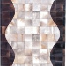 An Interesting 5' x 7' Leather Cowhide Pachwork Area Rug