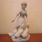 Vintage Porcelain Woman with ducks figurine
