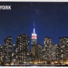 #131 New York Midtown Skyline at night lights postcard unused