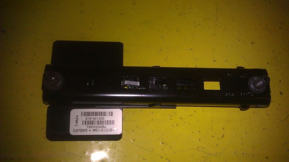 GENUINE FORD FOCUS OEM ADJUSTER AM51611C46AB / AM51611C46AB