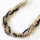 Fashion necklace with gold and black chain torsion