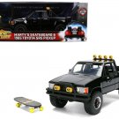 1985 Toyota SR5 Pickup Black w/ Marty's Skateboard Back to the Future 1/24 Jada