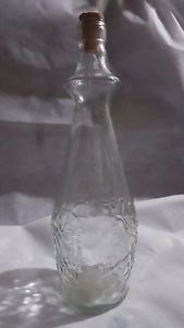 vtg 4/5 quart glass bottle with grape and leaf design approx 11" tall x 4" wide
