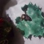 hand made plate signed Ella 1968 leaf and grapes
