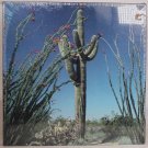 DESERT FLOWER  500 Piece puzzle Measures 18x24 Photography By L.L.T Rohdes new