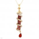 55mm Cylinder Pendant Holding 8.88ctw Garnet Encirled by .28ctw Diamonds 10K 18"