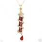55mm Cylinder Pendant Holding 8.88ctw Garnet Encirled by .28ctw Diamonds 10K 18"