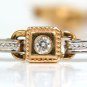 $5500 VIDEO CIRCLE & BAR .95CT DIAMOND BRACELET TWO TONED 14KT G/SI 7 INCH