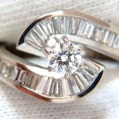 $6000 1.70CT NATURAL ROUND DIAMOND BAGUETTE CROSS OVER RING 18KT G/VS