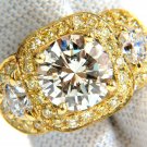 GIA 5.43ct. Brilliant Round Diamond Three stone ring & Fancy Yellows $72,000