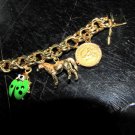 █14KT GOLD CHARM BRACELET 10 CHARMS STARFISH CAMEO BUTTERFLY JADE 47.3 grams