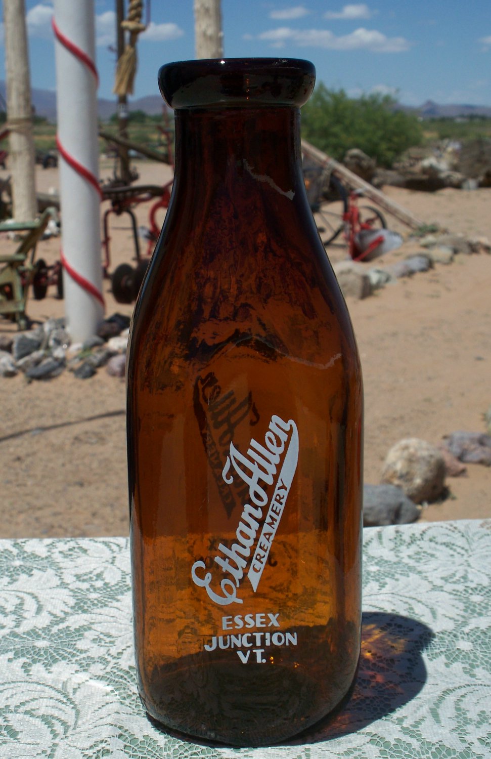 Ethan Allen Creamery Essex Junction, VT. empty brown amber colored