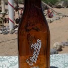Ethan Allen Creamery Essex Junction, VT. empty brown amber colored quart bottle