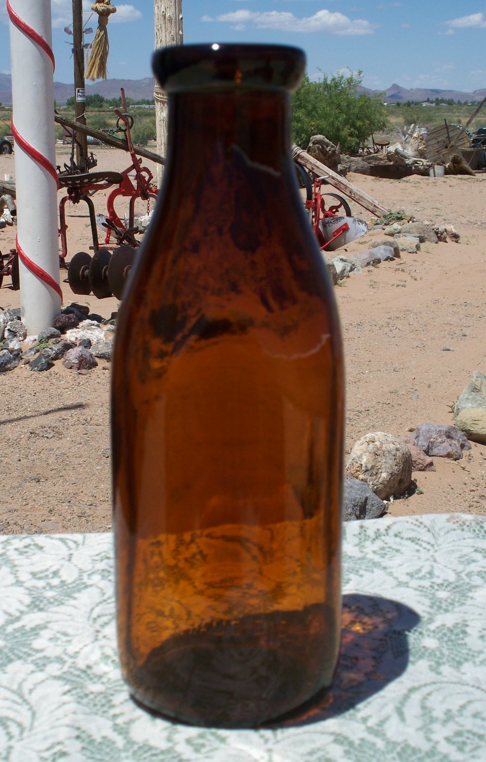 Ethan Allen Creamery Essex Junction, VT. empty brown amber colored