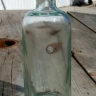 Dr. S. B. & H Co. M.L. light green colored bottle air bubbles almost fizz bubble