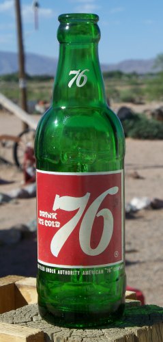 Get in the Spirit Drink Ice Cold 76! 76 soda bottle green bottle red