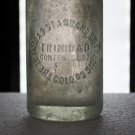 The Trinidad Standard Bottling Company Colo clear bottle used