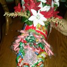 flower arrangement with chocolate and candy canes with lighted christmas tree mailbox