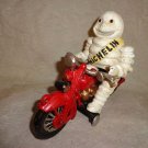 Cast Iron Michelin Man on Motorcycle
