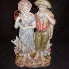 Dresden Style Porcelain Figurine of "Farmer and Wife"