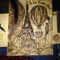 Wood-burned Parisian-themed art