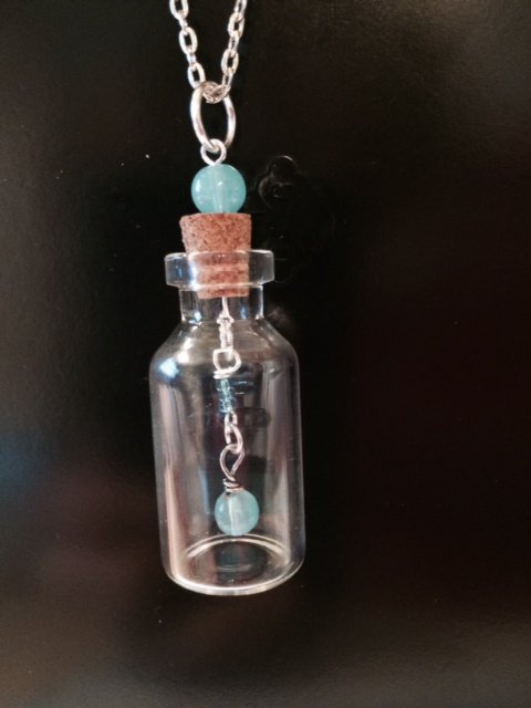 Beads in a cork bottle